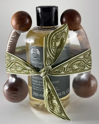 Aceite de masaje corporal The Body Shop 8,4 OZ & Herramienta de masaje de madera Foto 1 de 4