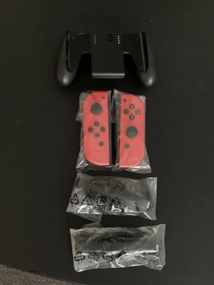 NEW Nintendo Switch Mario Red Joy-Con + Straps + Grip OLED Model OEM Genuine - Image 1 of 2