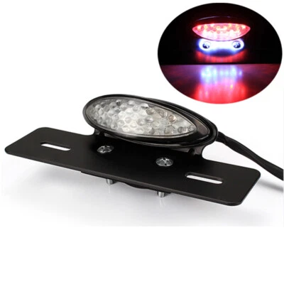 Luz trasera de freno para placa de matrícula de motocicleta soporte negro para picadora EE. UU. Foto 1 de 4