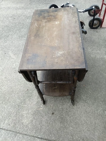 mcm small table On Rollers Needs Refinishing Cover