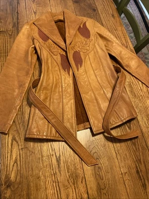 Vtg Floral Cut Out EAST WEST MUSICAL INSTRUMENTS 60s 70s Wrap Fit Leather Jacket - Image 1 of 4