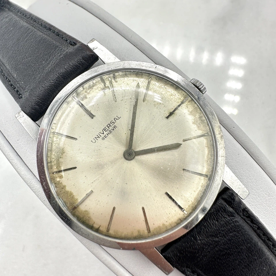 Vintage Universal Geneve Ultra Delgado, Tono Plateado, Cuero Negro, Funcionando, Pátina Foto 1 de 4