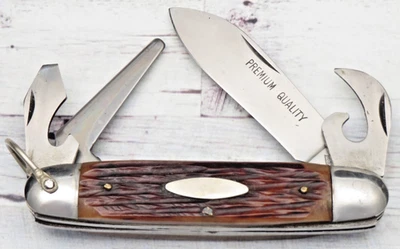 Cuchillo utilitario vintage de 1950 a 1960 XL CUBERTERÍA JAPÓN Scout hueso marrón plantilla Foto 1 de 4