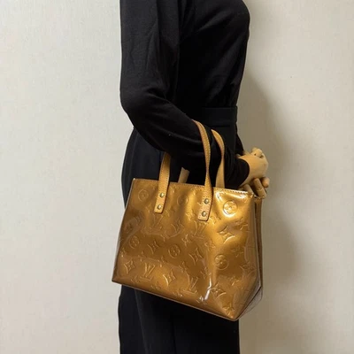 Bolso de Mano Louis Vuitton Reade PM Bronce Vernis Charol - Transferencia de Color Foto 1 de 4