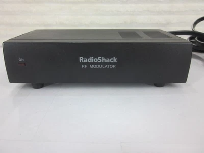 Radio Shack RF MODULATOR 15-1244 Coax TO RCA Audio & Video Converter - Image 1 of 4