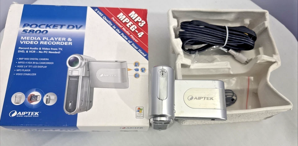 Videocámara digital reproductor multimedia portátil Aiptek DV 5800 plateada de 8 MP piezas no probadas Foto 1 de 4