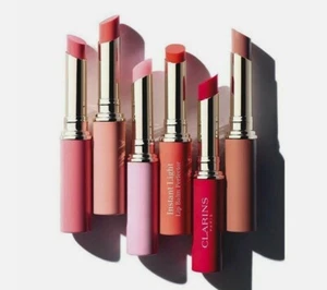 CLARINS ECLAT MINUTE BÁLSAMO LABIAL LUZ INSTANTÁNEA PERFECCIONADOR 1 OZ - TÚ ELIGES EL ESTILO - Imagen 1 de 9