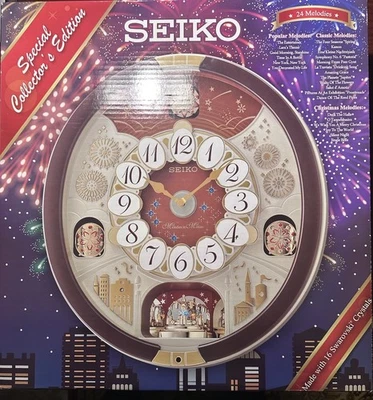 Reloj de pared Seiko Melodías en movimiento música navideña 24 canciones Swarovski QXM574BRH Foto 1 de 4