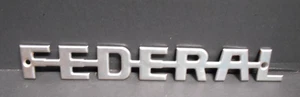 AJ42 Federal Motor Truck Co. Motorhauben-Seiten-/Heckklappenemblem, 10" x 11/4", ca. 1920er-30er Jahre - Bild 1 von 2