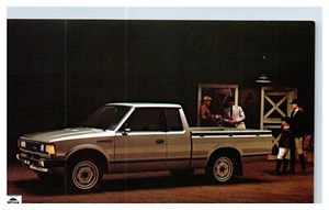Postal publicitaria de automóviles Datsun Trucks de Nissan años 70 - Imagen 1 de 2