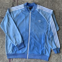 human race tracksuit