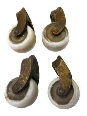 Set of 4 Vintage Used Porcelain Wheel Brass Metal Furniture Chair Casters Parts - Image 1 of 4