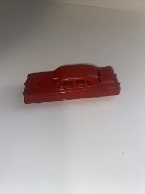 Cadillac de plástico rojo raro, con ruedas azules e imán de recogida en la parte inferior AI-0218 Foto 1 de 4