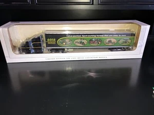 1/64 SpecCast Peterbilt 387 With 6015 John Deere Series On Trailer - Picture 1 of 4