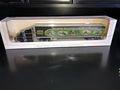 1/64 SpecCast Peterbilt 387 With 6015 John Deere Series On Trailer - Image 1 of 4