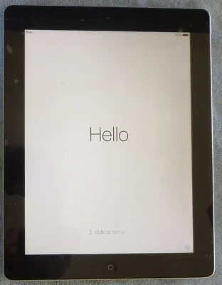 iPad Generación 3, 32GB con funda, cable de carga y protector de pantalla; funcionando Foto 1 de 4