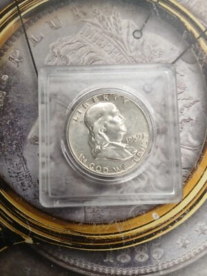 Silver  1959 D  Franklin Half Dollar enclosed inside  holder case      TP-9334 - Image 1 of 2