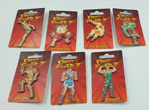 STREET FIGHTER II: JUEGO DE 7 INSIGNIAS HECHAS POR DUFORT & SONS EN 1993 (POR) - Imagen 1 de 4