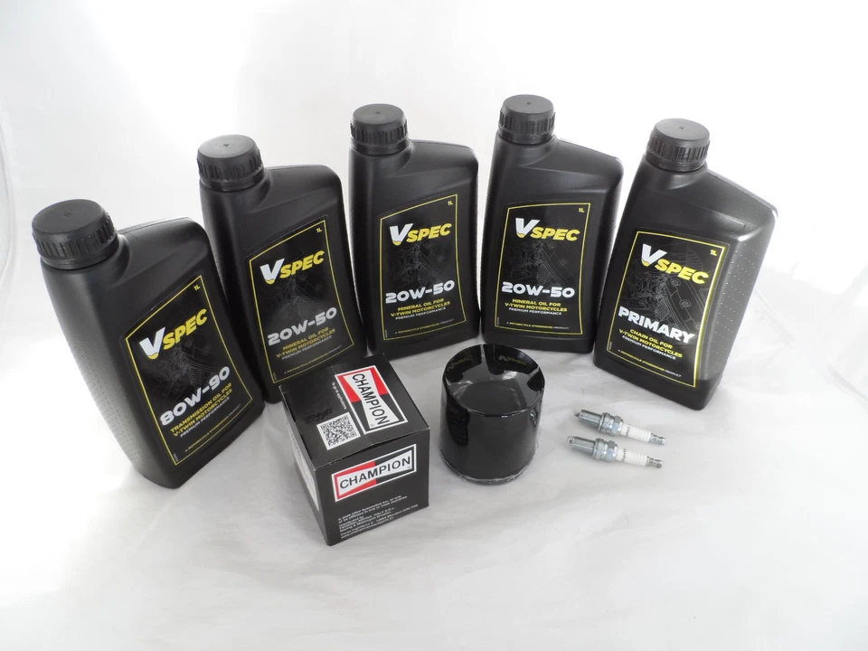 Kit de servicio para aceite Harley-Davidson Twin Cam y filtro y enchufes negros Champion Foto 1 de 1