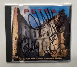 CD ROCK BLOCK FIRMADO POR PETRA JOHN SLITT BOB HARTMAN PAUL SIMMONS GREG BAILEY - Imagen 1 de 3