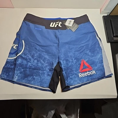 Pantalones Cortos Hombre Reebok Auténticos UFC Gladiator Azul Medianos 32" Nuevos Con Etiquetas Foto 1 de 4