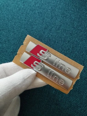 2x S-Line emblema logotipo guardabarros plata brillante Sline Audi A3 A4 A5 A6 A7 A8 - Imagen 1 de 3