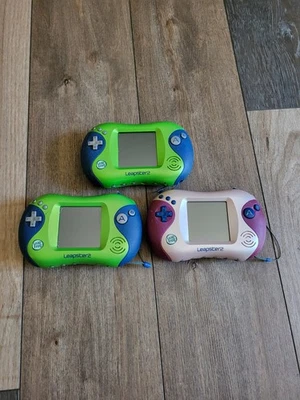 Lot Of 3 LeapFrog Leapster 2s For Parts Not Working Blue And Green And Pink - Image 1 of 4