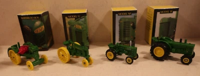 ERTL John Deere 1/64 histórico 4 piezas. Juego de tractor; nuevo en caja, 1988 Foto 1 de 4