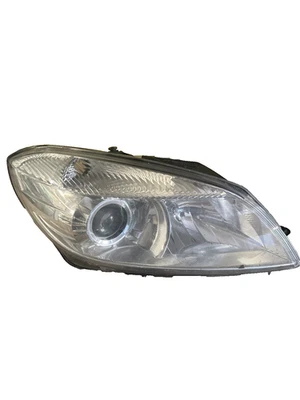 BI Halogenscheinwerfer rechts Skoda Fabia II (542) 1,2i 44kW 60PS BJ.2009 - Bild 1 von 4