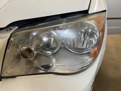 Used Left Headlight Assembly fits: 2010 Chrysler Town & country halogen Left Gra - Image 1 of 4
