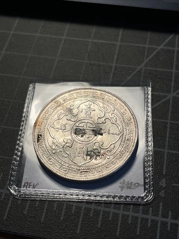 Britain / Hong Kong 1909 Trade Dollar heavy chopmarks and weird overstrike Cover