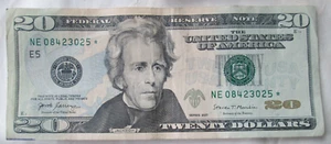 Billete *Star* 2017 de 20 USD, NE08423025*, estado automático, circulado - Imagen 1 de 4