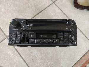 AUTORADIO LETTORE CD STEREO JEEP GRAND CHEROKEE 1998/2004 + MASCHERINA - Foto 1 di 4