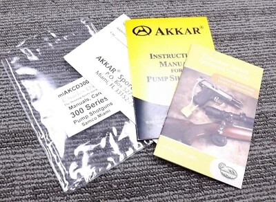 Escopeta bomba manual Akkar Charles Daly 300, manual NSSF, tarjeta Wty 3 documentos Foto 1 de 4