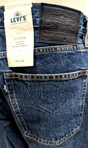 Pantalones de mezclilla para hombre LEVI'S 511 ajustados hechos y hechos a mano grandes "E" azules lavados a la piedra nuevos - Imagen 1 de 13
