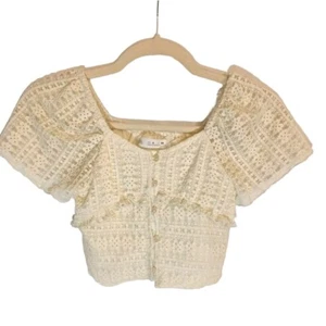 Top corto Zara manga corta encaje talla 9 crema forrado botones volantes mangas transparentes - Imagen 1 de 6