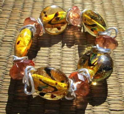 Brazalete elástico de alambre de plata con cuentas de oro de vidrio ámbar vintage joyería elegante Foto 1 de 4