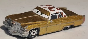 Cadillac Coupe Deville Disney Pixar Cars Tex Dinoco 1975 Gold Die Cast - Picture 1 of 6
