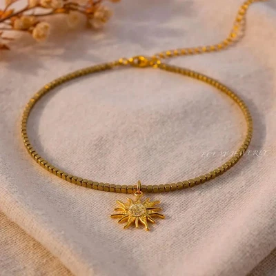 Hematite Choker Necklace: Sun Pendant with Cubic Zirconia, Adjustable Design - Image 1 of 4