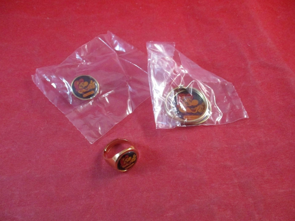 Super Mario Bros. Nintendo NES/SNES Era Mario Ring, Keychain, and Pin Set - Image 1 of 4