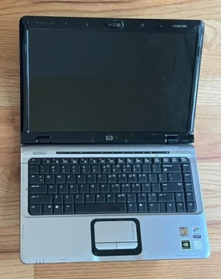 Portátil HP Pavilion DV2000 edición especial pantalla ancha sin HD - solo piezas Foto 1 de 4