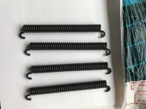 Austin A30,A35 front brake shoe return springs NEW OLD STOCK - Picture 1 of 1
