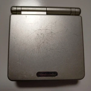 Game Boy Advance SP Starlight Gold with Charger, toysrUS - Picture 1 of 8