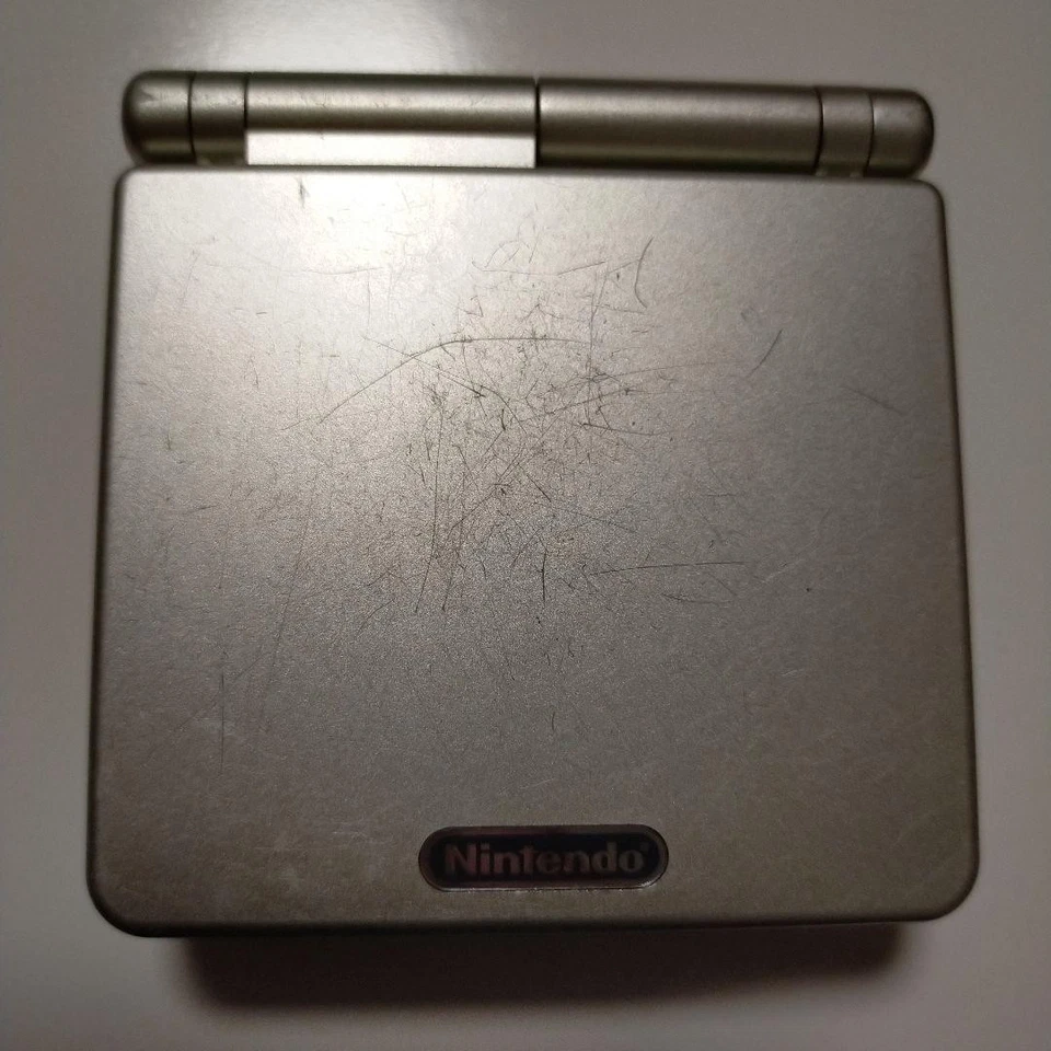 Game Boy Advance SP Starlight Gold with Charger, toysrUS - Image 1 of 4