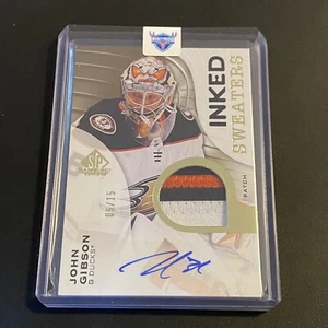 2023-24 UD SP Game Used John Gibson Inked Sweaters /15 Patch Auto Gold #IS-JG - Picture 1 of 2