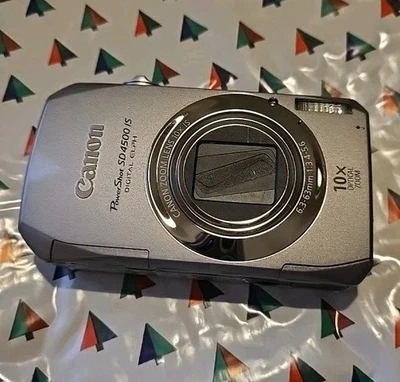 Cámara digital Canon PowerShot SD4500 IS 10 MP plateada Foto 1 de 3