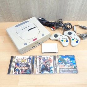 Sega Saturn console with 2 controllers, 3 games, memory & cables Japan White