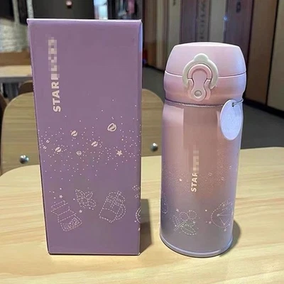 Taza de vacío Starbucks Original 2025 12 oz flor de cerezo en polvo púrpura aislada Foto 1 de 4