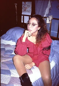Feb 1993 35mm Color Slide Transparency Girl Red Ruffled Outfit Quilt Glasses - Picture 1 of 1