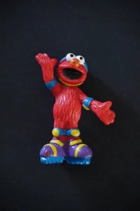 SESAMSTRASSE ROLLSCHUH ELMO 2,5" PVC FIGUR TORTENAUFLEGER - Bild 1 von 2